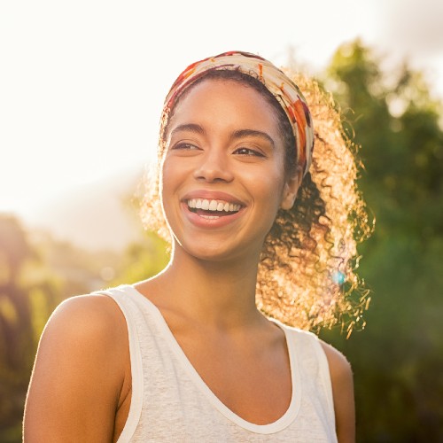 woman smiling on a sunny day