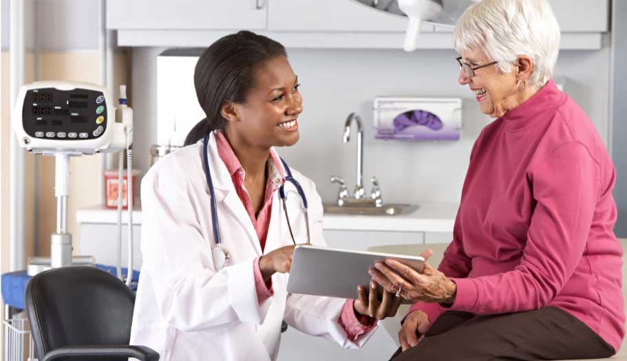 Senior woman consulting with a female doctor